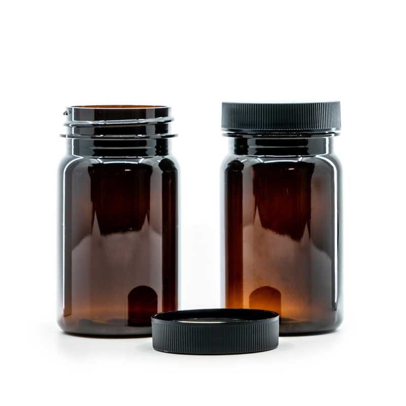 Envase de plástico para comprimidos, ámbar, tapa negra, 100 ml