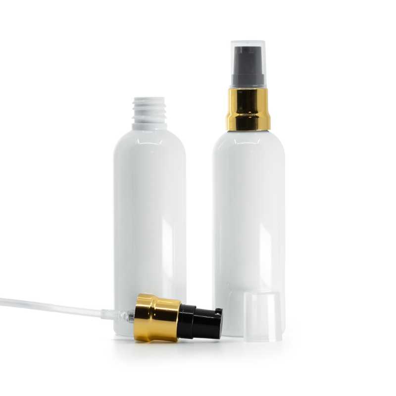 Botella de plástico, blanca, dosificador negro dorado brillante, tapa transparente, 100 ml