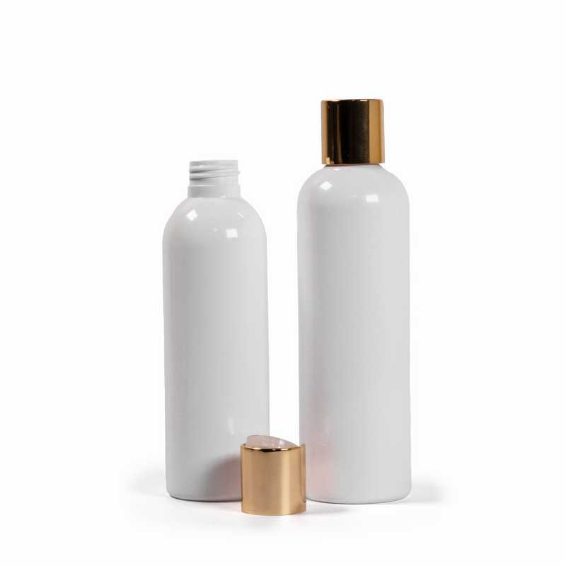 Botella de plástico blanca, tapón flip-top dorado, 200 ml