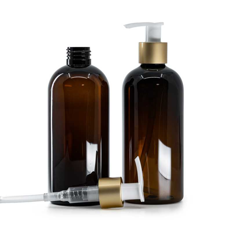 Botella de plástico ámbar, bomba dosificadora blanca con cuello dorado mate, 300 ml