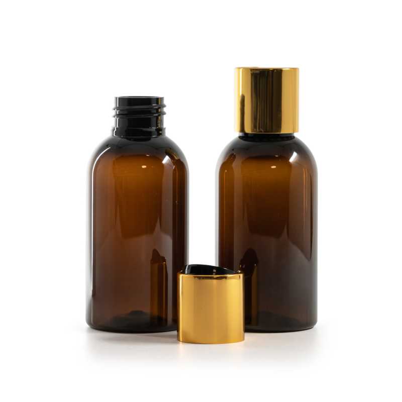 Frasco de plástico marrón, tapón disc-top dorado con inserto negro, 100 ml