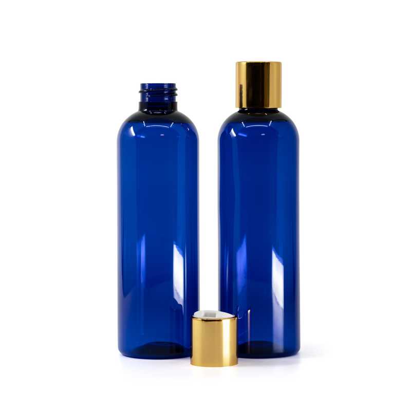 Botella de plástico azul, tapón disc-top blanco con anillo dorado, 250 ml