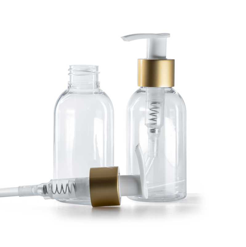Frasco de plástico transparente, bomba loción blanca con cuello dorado mate, 100 ml