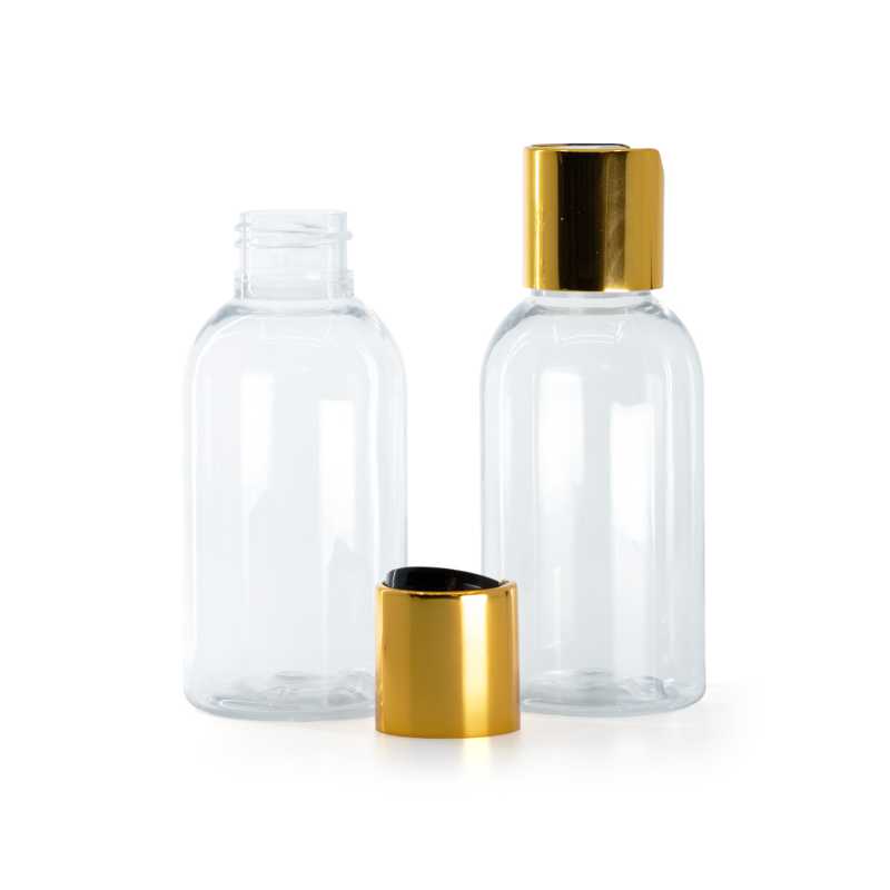 Botella de plástico transparente, tapón disc-top, dorado con centro negro, 100 ml