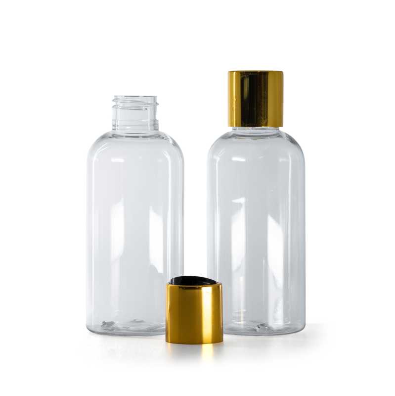 Botella de plástico transparente, 150 ml, tapón disc-top dorado con centro negro