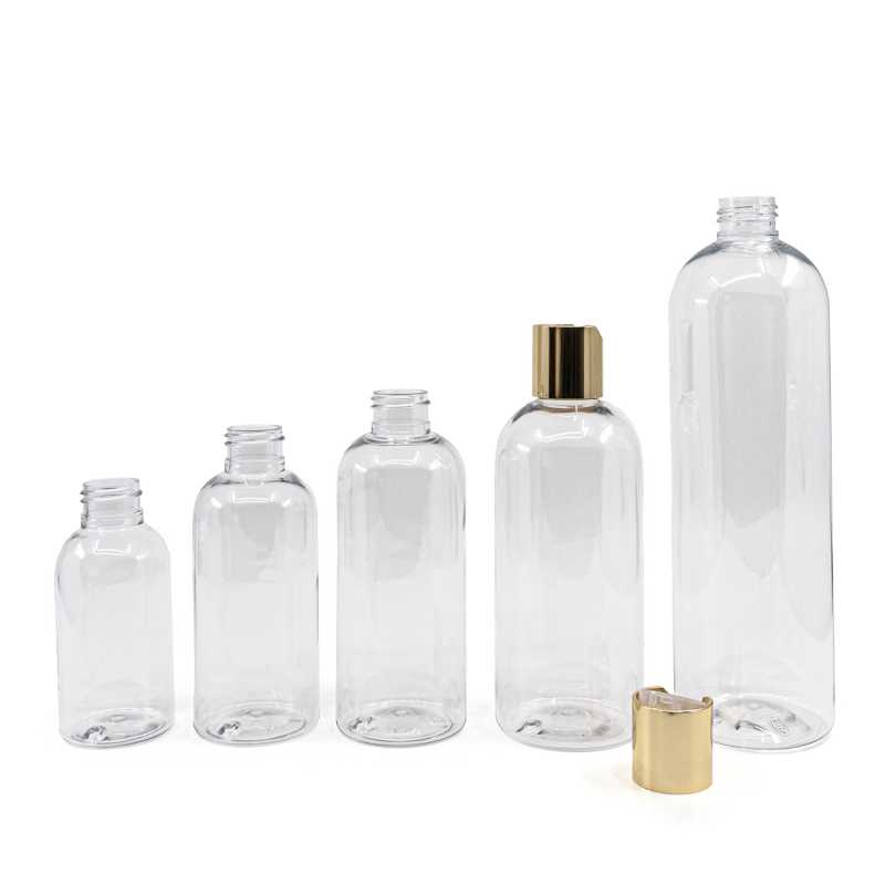 Botella de plástico transparente redonda, tapón disc-top dorado, 100 ml