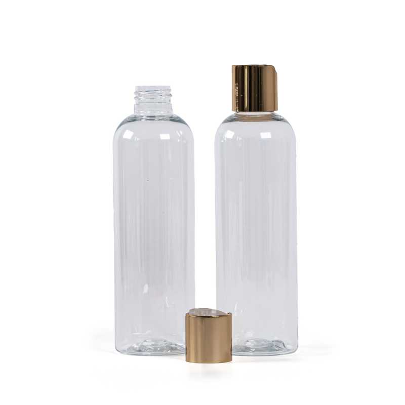 Botella de plástico transparente, tapón disc-top dorado, 250 ml