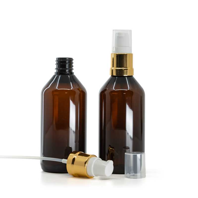 Botella de plástico, ámbar, dosificador blanco y dorado brillante, 115 ml