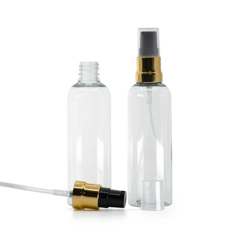 Botella de plástico, transparente, dosificador negro y dorado brillante, tapón transparente, 100 ml
