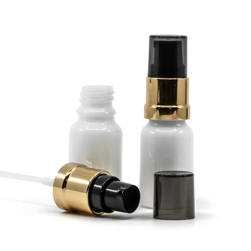 Frasco de vidrio blanco, dispensador negro brillante con detalles dorados y sobretapa ahumada, 10 ml