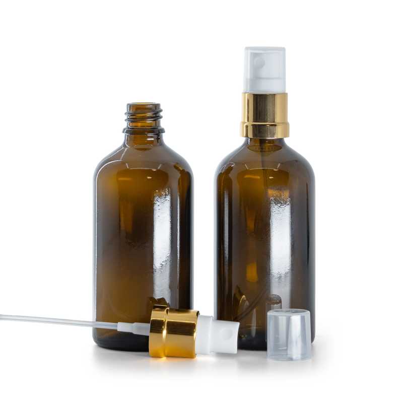 Botella de vidrio, ámbar, pulverizador blanco dorado, 100 ml