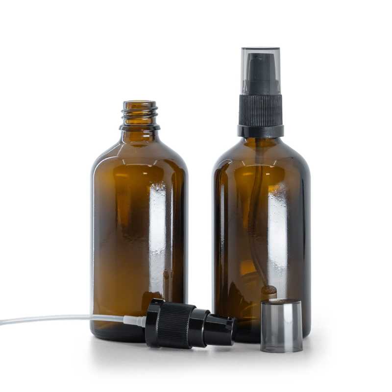 Botella de vidrio ámbar, dispensador de crema con sobretapa ahumada, 100 ml