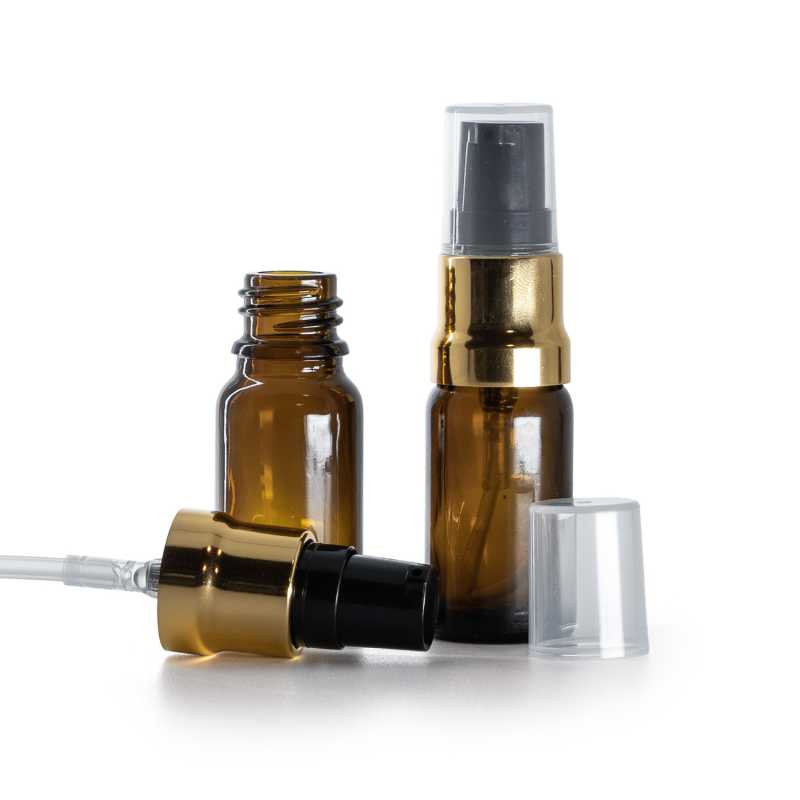 Frasco de vidrio ámbar, dosificador negro y dorado brillante con tapa transparente, 10 ml