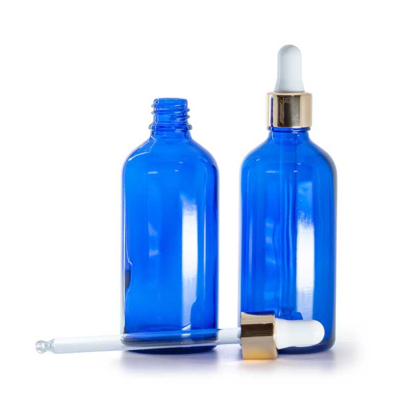 Frasco de vidrio, azul, cuentagotas blanco y dorado, 100 ml