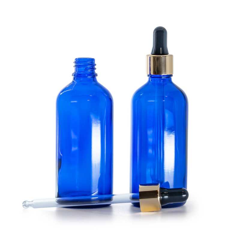 Botella de vidrio, azul, cuentagotas negro y dorado, 100 ml