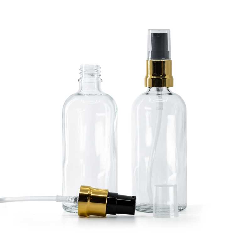 Botella de vidrio, transparente, dispensador negro y dorado brillante, tapón transparente, 100 ml