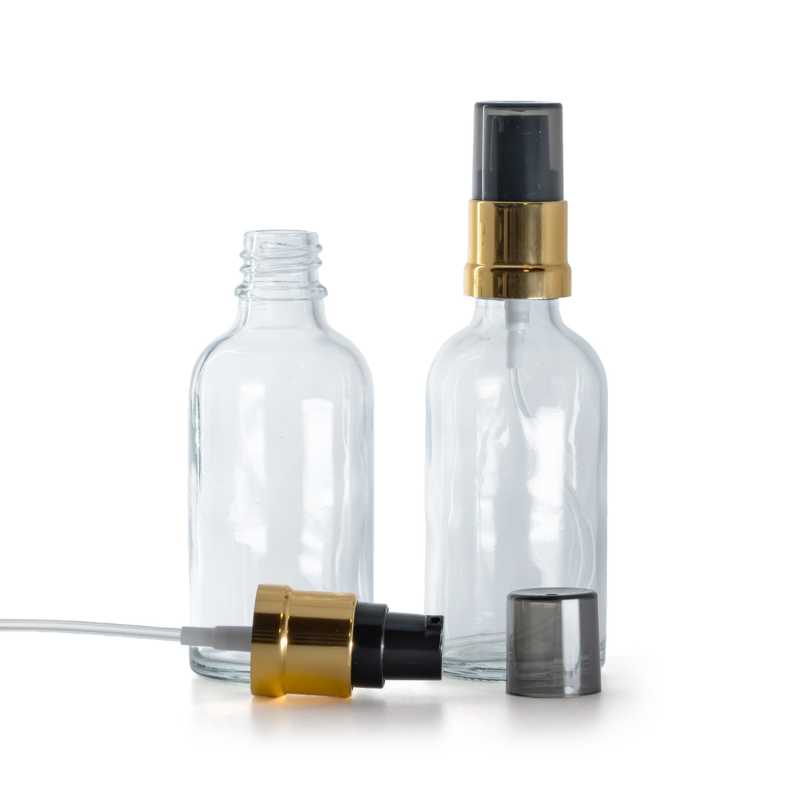 Frasco de vidrio transparente, bomba negra y dorada brillante con sobretapa ahumada, 50 ml
