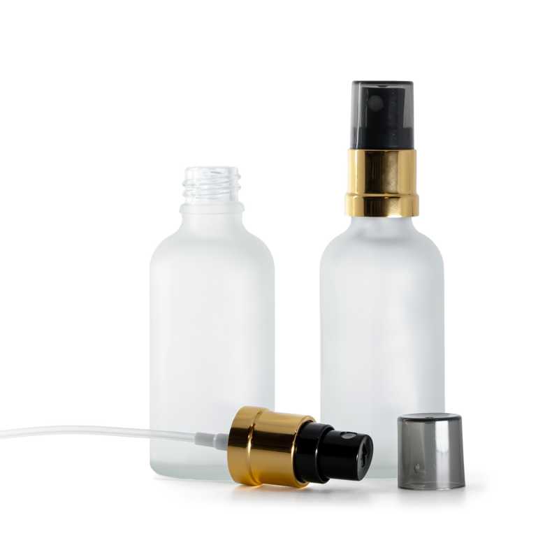 Frasco de vidrio transparente esmerilado, pulverizador negro y dorado con sobretapa ahumada, 50 ml
