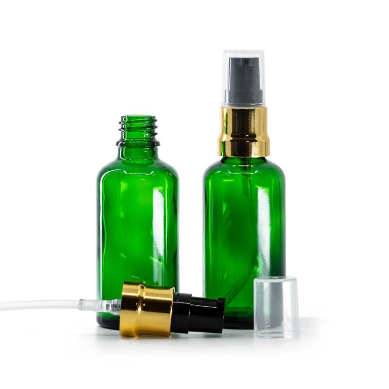Botella de vidrio, verde, dosificador negro dorado brillante, tapa exterior transparente, 50 ml