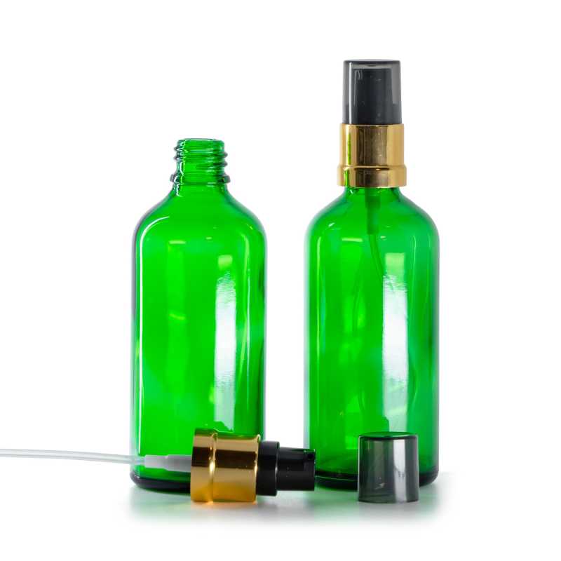 Frasco de vidrio verde, dispensador negro y dorado brillante con sobretapa ahumada, 100 ml